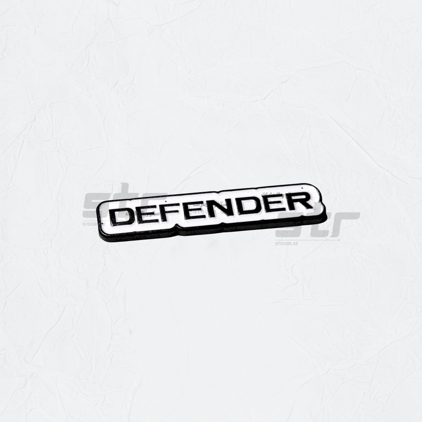 Badge DEFENDER