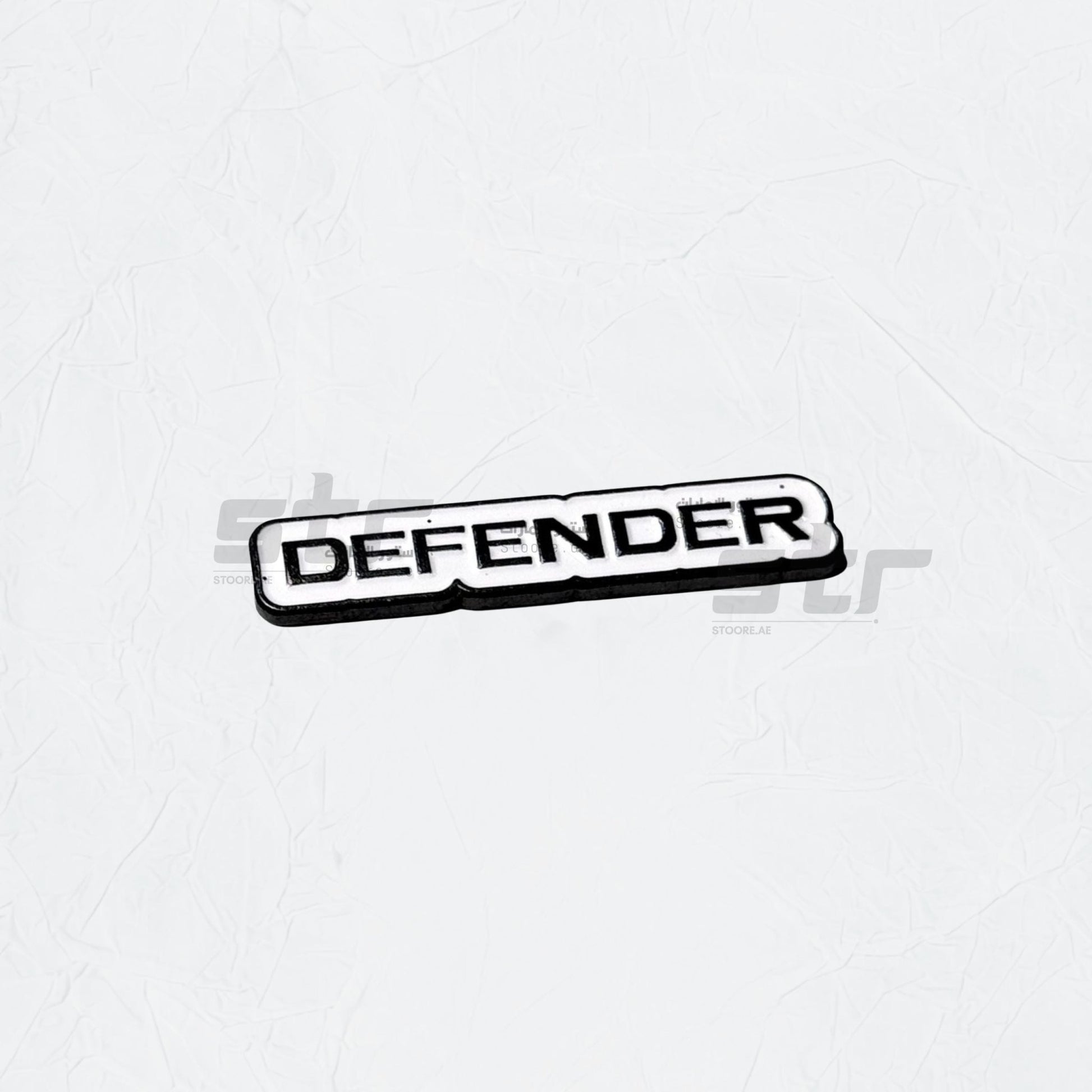Badge DEFENDER
