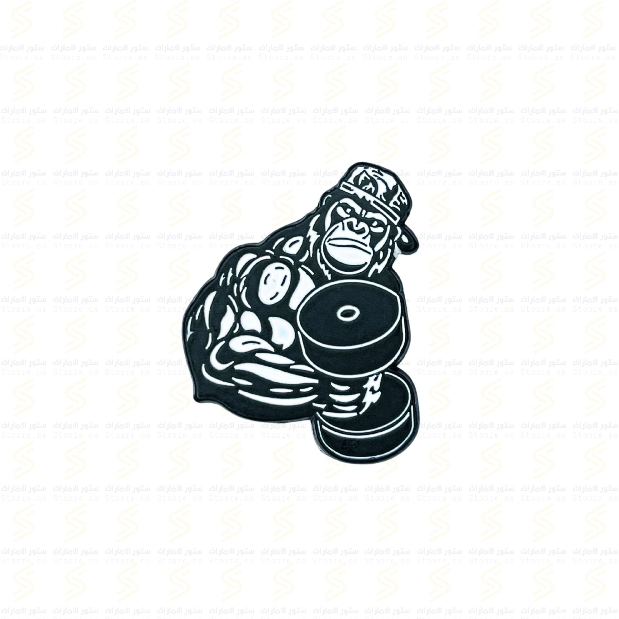 Badge Gorilla with Dumbbell