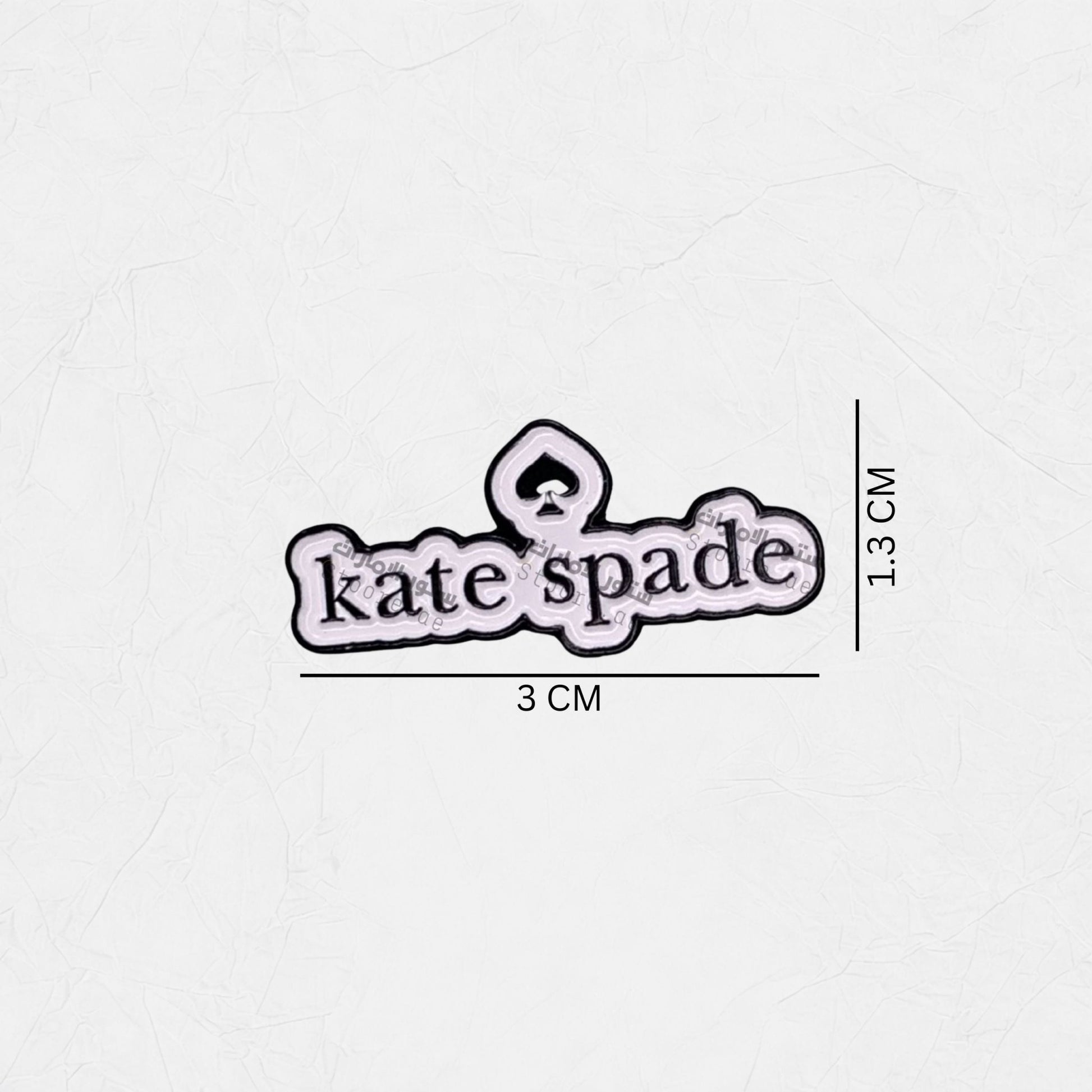 Badge Kate Spade