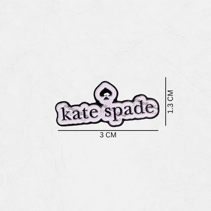Badge Kate Spade