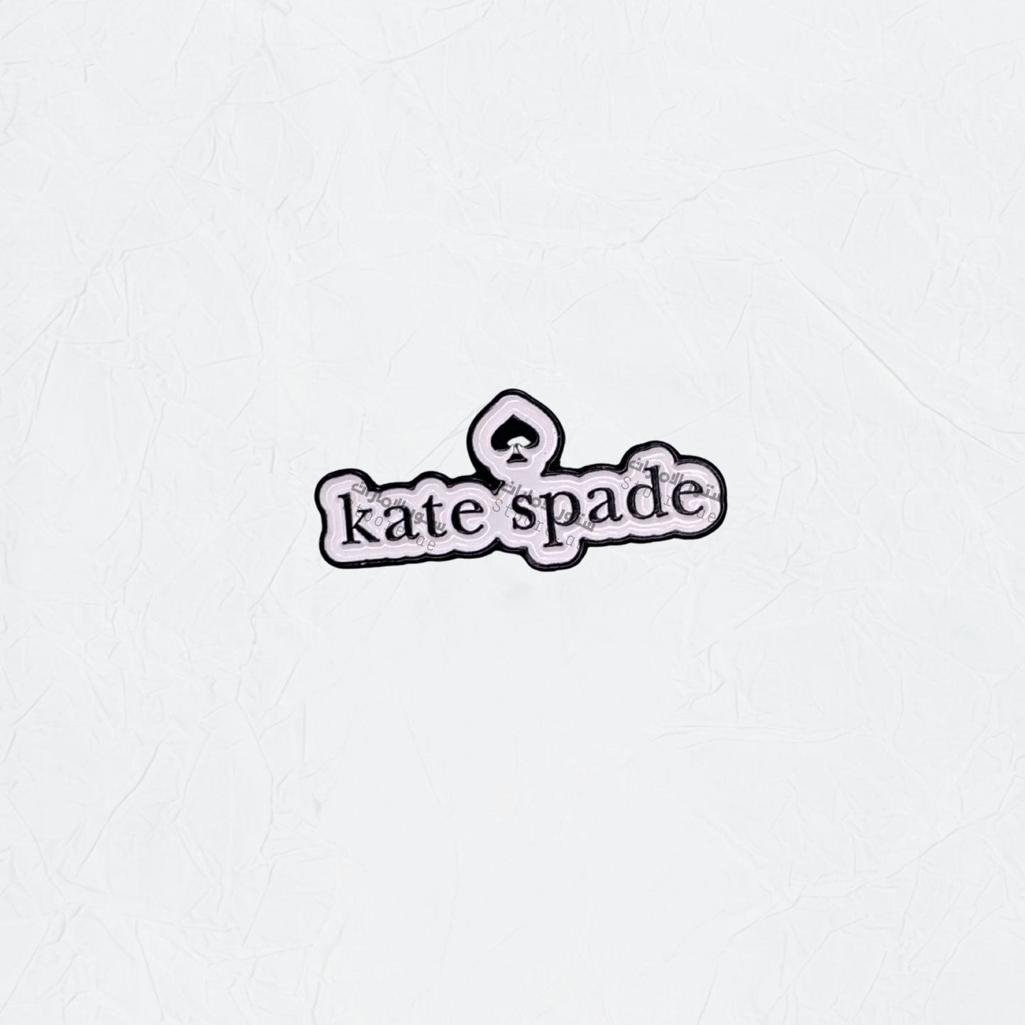 Badge Kate Spade