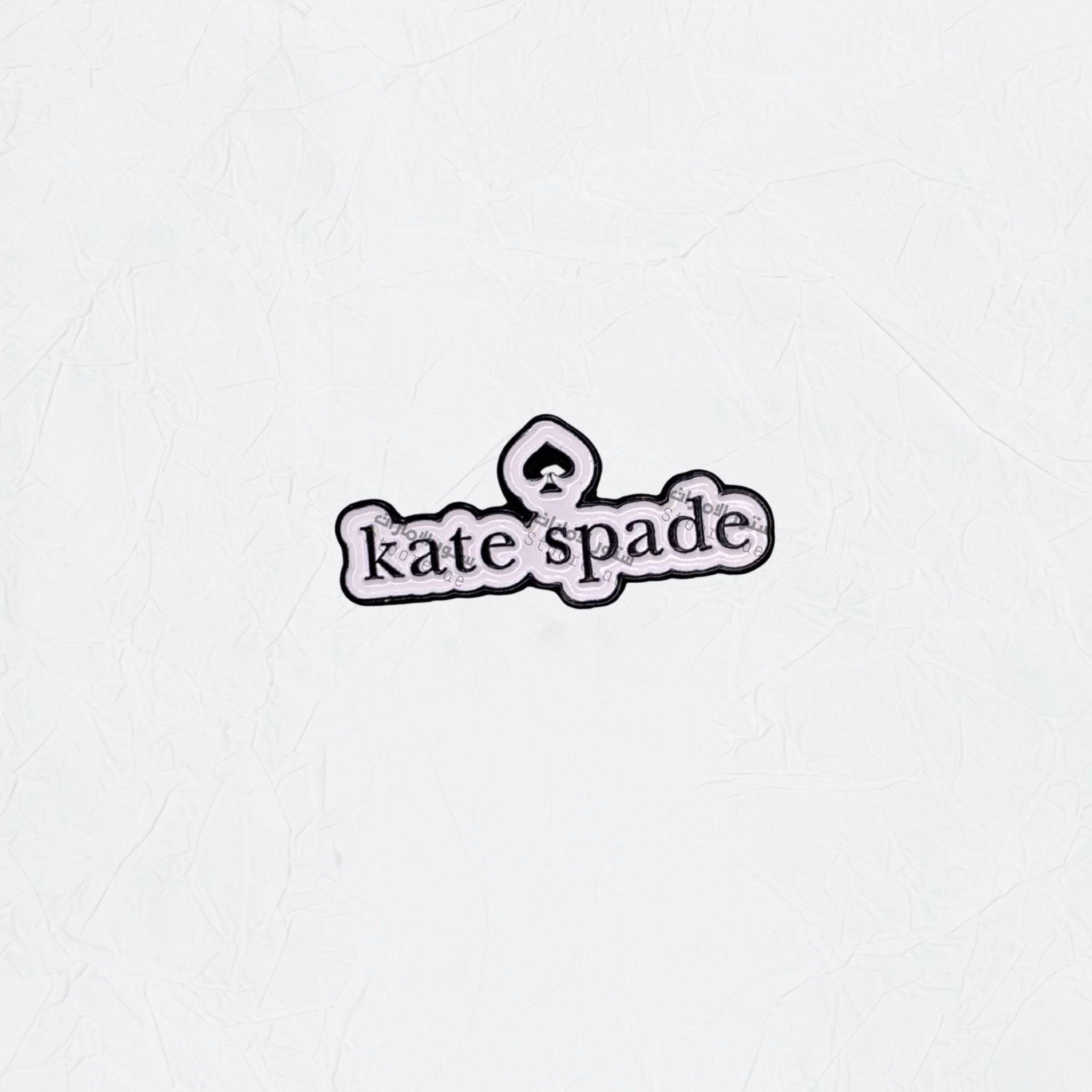 Badge Kate Spade
