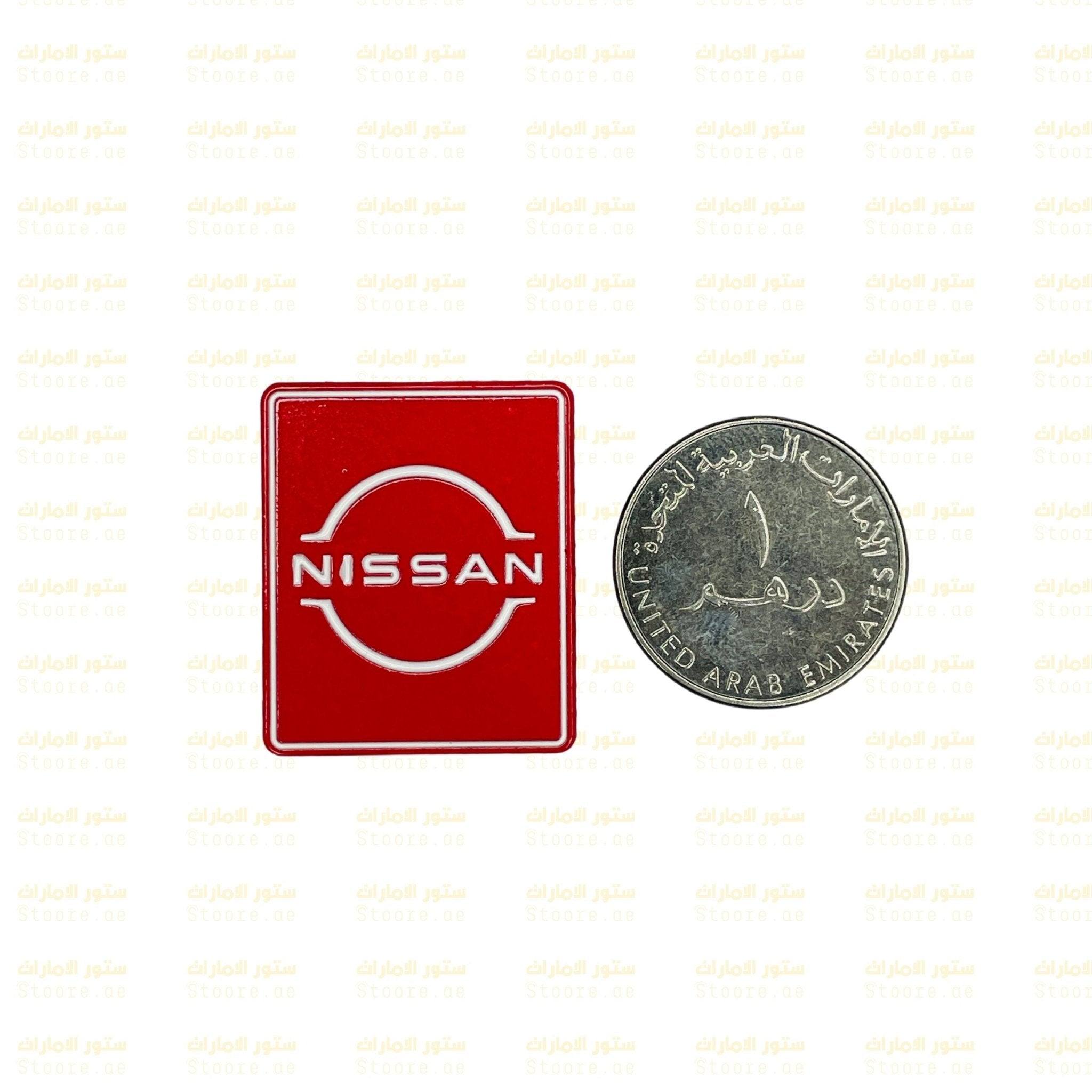 Badge NISSAN