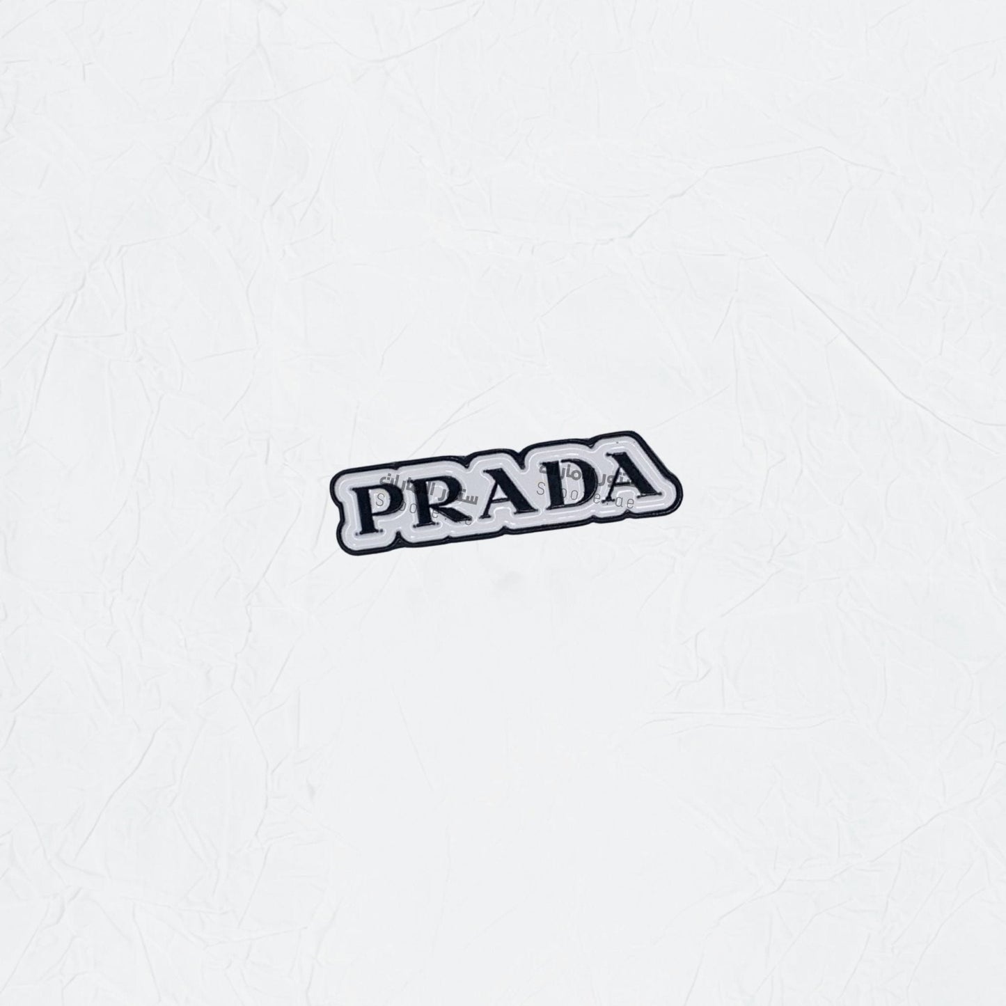 Badge PRADA
