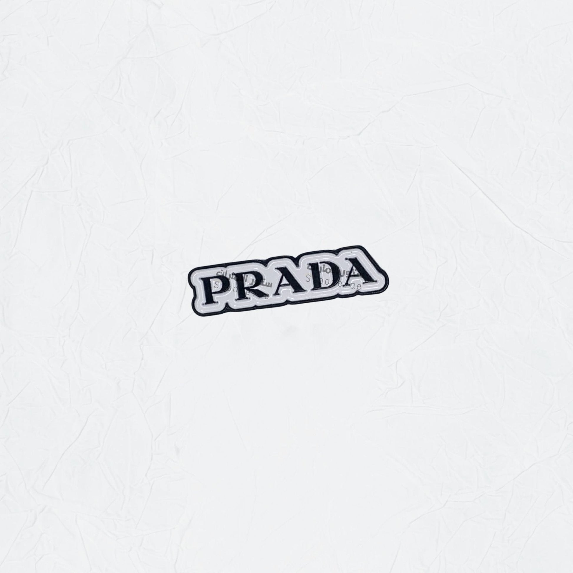 Badge PRADA