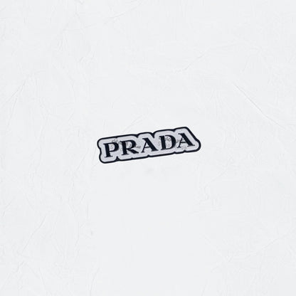 Badge PRADA