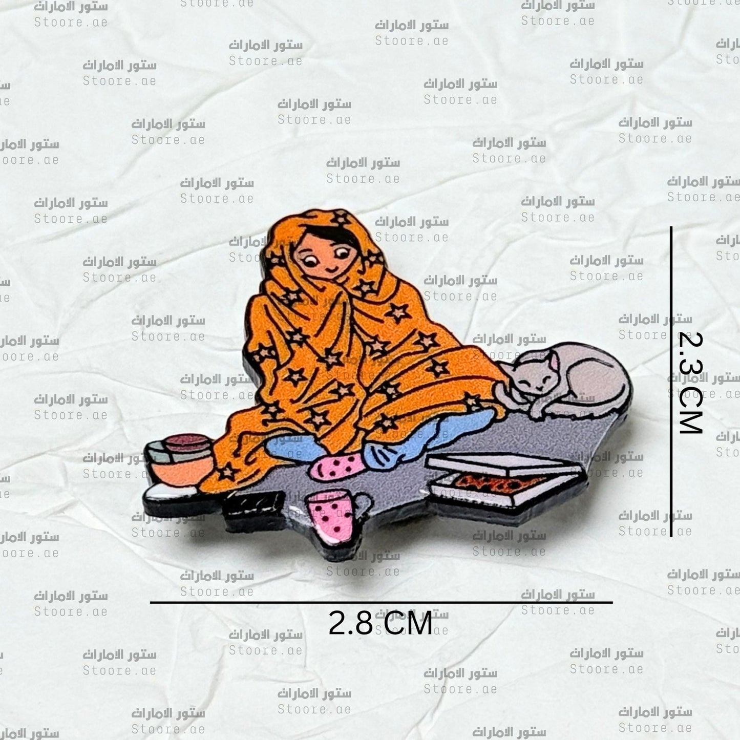 Badge Person Wrapped in a Blanket With a Cat
