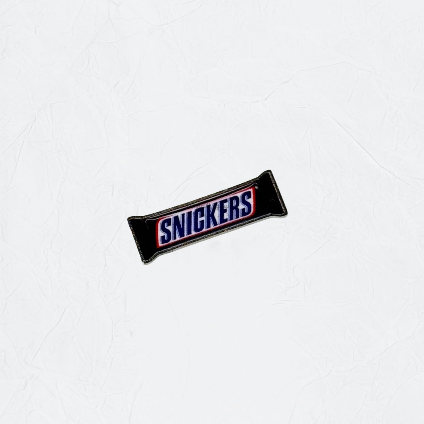 Badge SNICKERS