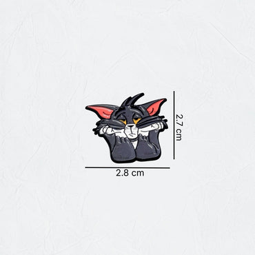 Badge Tom